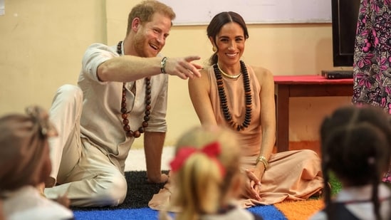 The couple, in the West African nation for the first time on the invitation of its military, visited the Lightway Academy college which receives support from their Archewell foundation to educate and train young girls affected by conflicts in Nigeria.(AFP)