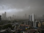 Mumbai and neighbouring metropolitan areas on Monday received rains accompanied with dust storms, lightning, gusty winds and thunder, disrupting Metro and local train services.(HT Photo/Anshuman Poyrekar)