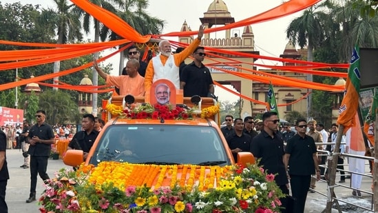 PM Modi was also accompanied by Uttar Pradesh chief minister Yogi Adityanath. The PM is seeking a third consecutive term from the Varanasi seat that will go to polls on June 1 in the seventh and last phase of the Lok Sabha election.(HT Photo/Rajesh Kumar)