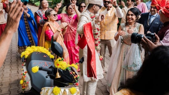 Bengaluru resident Darshan Patel danced next to an Ather EV at his wedding. (X/@peakbengaluru)