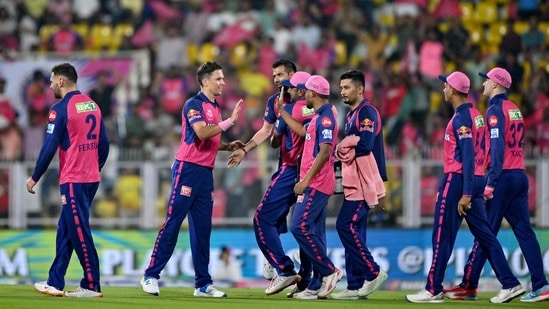 Rajasthan Royals' Trent Boult (2L) celebrates with teammates after taking the wicket of Punjab Kings' Prabhsimran Singh (not pictured) during the Indian Premier League (IPL)(AFP)