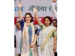 Congress General Secretary Priyanka Gandhi Vadra with JMM leader Kalpana Soren at a public meeting in Godda, Jharkhand. (PTI)