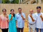 Delhi Chief Minister Arvind Kejriwal, along with his family members, including his wife Sunita Kejriwal, cast their ballots at a polling booth in the Civil Lines area of the Chandni Chowk Lok Sabha constituency in New Delhi on Saturday.(PTI)