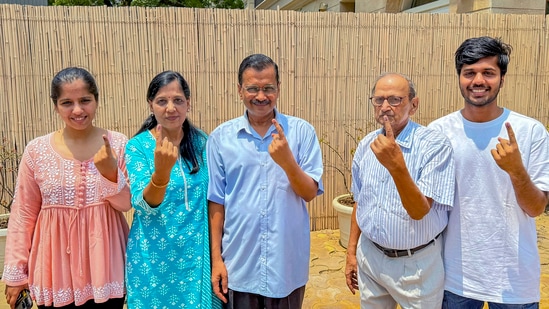 Delhi Chief Minister Arvind Kejriwal, along with his family members, including his wife Sunita Kejriwal, cast their ballots at a polling booth in the Civil Lines area of the Chandni Chowk Lok Sabha constituency in New Delhi on Saturday.(PTI)