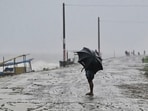 Severe winds and heavy rainfall battered the coastal regions of Bangladesh and India as Cyclone Remal made its late Sunday landfall. This caused widespread power outages due to fallen power poles and uprooted trees.(AFP)