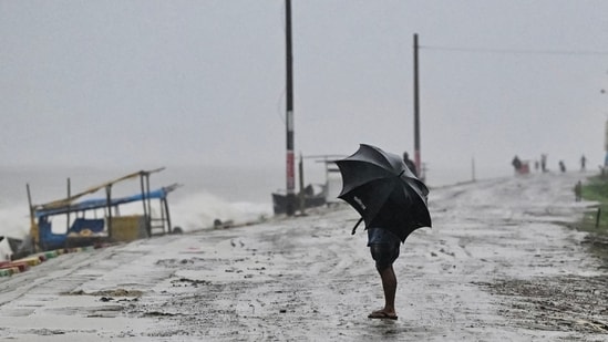 Severe winds and heavy rainfall battered the coastal regions of Bangladesh and India as Cyclone Remal made its late Sunday landfall. This caused widespread power outages due to fallen power poles and uprooted trees.(AFP)