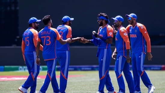 India players celebrate a catch during an exhibition cricket match between Bangladesh and India at the Nassau County International Cricket Stadium(AP)