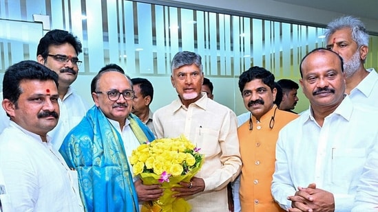 Telugu Desam Party President N Chandrababu Naidu congratulates Andhra Pradesh Bharatiya Janata Party (BJP) in-charge Siddharth Nath Singh as NDA is leading in the Lok Sabha Polls, on Tuesday.
