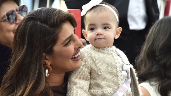 Priyanka Chopra revealed daughter Malti Marie Chopra Jonas's face for the first time at the Jonas Brothers' Hollywood Walk of Fame star installation ceremony in January 2023.(Jordan Strauss/Invision/AP)
