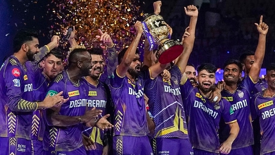 Chennai: Kolkata Knight Riders players celebrate with the Indian Premier League (IPL) 2024 trophy after winning the final match against Sunrisers Hyderabad at MA Chidambaram Stadium(PTI)