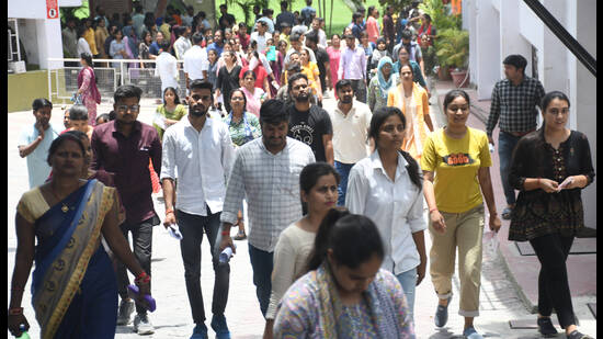 Candidates coming out of the examination centre after the BEd Entrance Exam at National PG College in Lucknow on Sunday (HT )