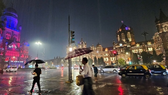 Mumbai Rain: Parts Of Mumbai witnessed waterlogging after rain lashed parts of city. Monsoon arrived in the city on Sunday, two days ahead of the normal schedule, due to favourable conditions along the Maharashtra coast, according to the India Meteorological Department (IMD).(ANI)