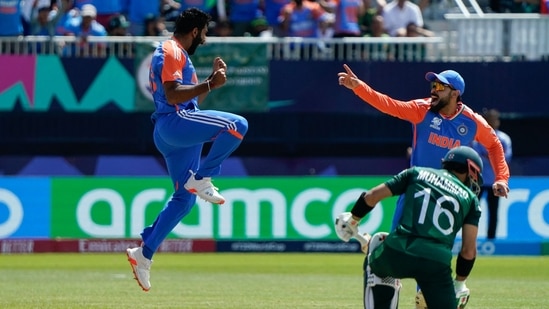 India's Jasprit Bumrah (L) celebrates after dismissing Pakistan's Mohammad Rizwan during the ICC men's Twenty20 World Cup 2024 match against Pakistan.(AFP)