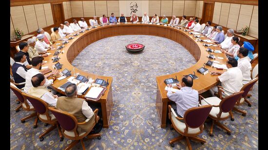 This handout photograph taken and released on June 10, 2024 by the Indian Press Information Bureau (PIB) shows India's Prime Minister Narendra Modi (C) holding the first cabinet meeting, in New Delhi (AFP)