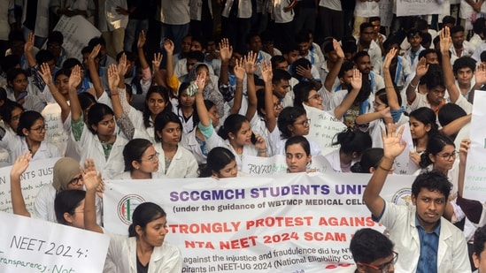 Members of Trinamool Chhatra Parishad (TMCP) staged a protest against the alleged irregularities in the NEET-UG examination results, in Kolkata on Tuesday.&nbsp;(Saikat Paul)