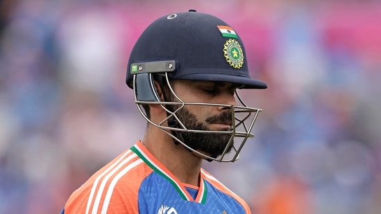 India's Virat Kohli reacts as he walks off the field after losing his wicket (PTI)