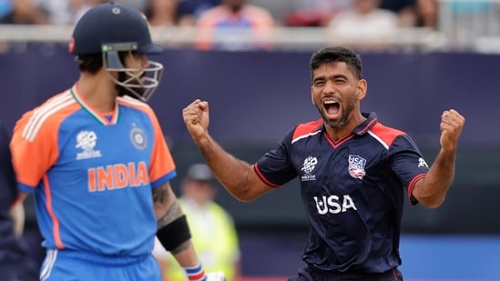 United States' Saurabh Nethralvakar, right, celebrates the dismissal of India's Virat Kohli, left, during the ICC Men's T20 World Cup cricket match between United States and India at the Nassau County International Cricket (PTI)