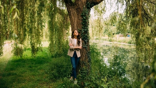  In this undated handout photo issued by Kensington Palace, Catherine, Princess of Wales stands under a tree in Windsor, England. 