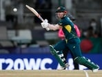 Chasing 141, Australia reached 100/2 in 11.2 overs, with rain stopping play. Play didn't resume and by the DLS method, they were well ahead, winning by 28 runs. David Warner (53*) got an unbeaten half-century for Australia.(PTI)