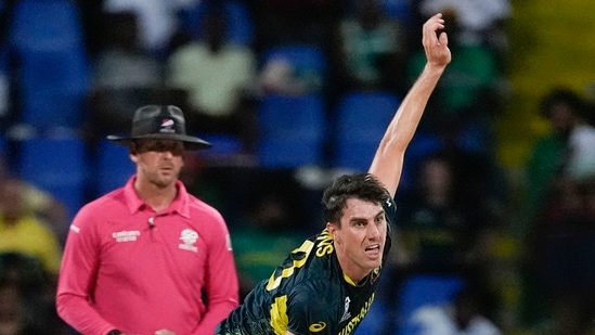 Australia's Pat Cummins bowls during the ICC Men's T20 World Cup cricket match between Australia and Bangladesh(PTI)