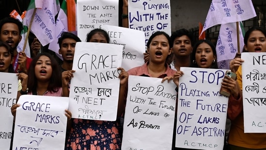 NEET-UG 2024: Trinamool Chhatra Parishad (TMCP), students wing of All India Trinamool Congress (TMC) supporters staged a protest against recent scam in NEET and UGC-NET exam in front of Asutosh College in Kolkata, India, on Saturday, June 22, 2024. (Photo by Samir Jana/ Hindustan Times)