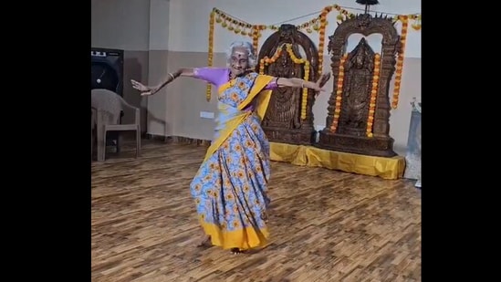 Snapshot of the woman dancing in old age home. 
