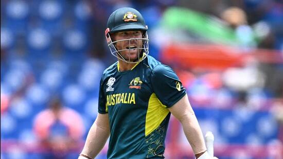 Australia's David Warner walks back after getting dismissed in his last T20 innings, against India on Monday. (AFP)