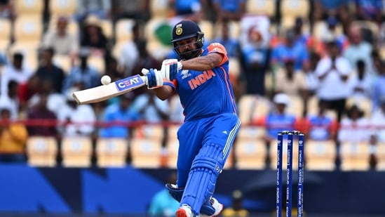 India's captain Rohit Sharma hits a 6 during the ICC men's Twenty20 World Cup 2024 Super Eight cricket match between Australia and India at Daren Sammy National Cricket Stadium in Gros Islet, Saint Lucia on June 24(AFP)