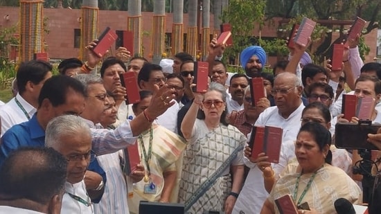 Amid the controversy over the appointment of the pro-tem speaker, several leaders of the Opposition INDIA bloc staged a protest in front of the Gandhi statue in the Parliament, holding copies of the Constitution.(HT Photo)