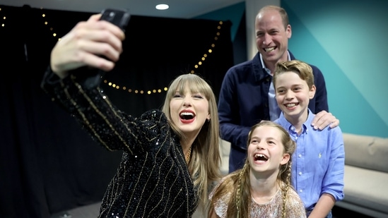 Taylor Swift posted a selfie with Royal family members and her boyfriend Travis Kelce with the message, "Happy Bday M8!," expressing her excitement at having Prince William and his kids as guests.(X)