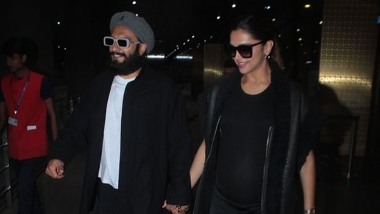 Deepika Padukone and Ranveer Singh twin in black at the airport. (HT Photo/Varinder Chawla)