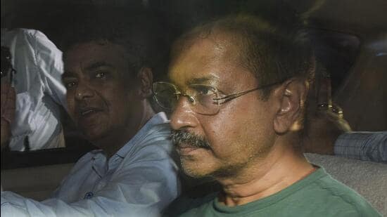 CBI officials leave with Delhi chief minister Arvind Kejriwal from Rouse Avenue Court after the court sent him to the probe agency custody in New Delhi on Wednesday. (PTI)