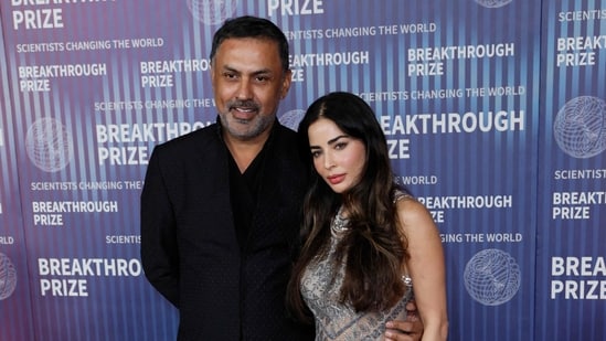 Indian entrepreneur and former Softbank president Nikesh Arora (L) and Ayesha Thapar arrive at the Tenth Breakthrough Prize Ceremony at the Academy Museum of Motion Pictures in Los Angeles, California, on April 13, 2024.(AFP)