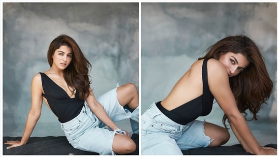 Wamiqa Gabbi raised temperature in this stunning and sizzling bodysuit with bare back and a plunging neckline. She teamed it with a ripped light wash denim jeans. 