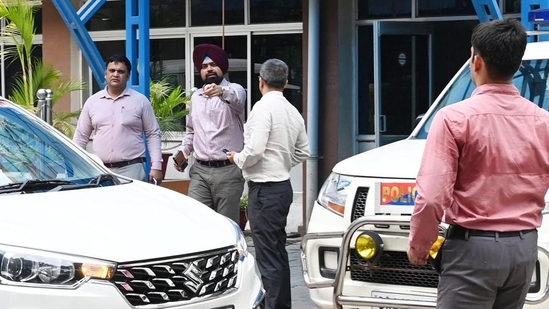 A CBI team exiting the Economic Offences Unit (EOU) office in Patna in NEET paper leak case. (Santosh Kumar/ Hindustan Times)