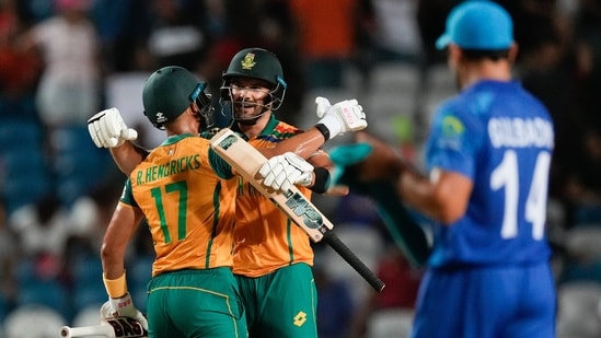 South Africa's Aiden Markram and Reeza Hendricks celebrate after beating Afghanistan