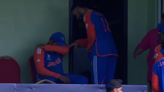 Virat Kohli tries to cheer up Rohit Sharma after the India skipper was overwhelmed with emotions.(Screengrab)