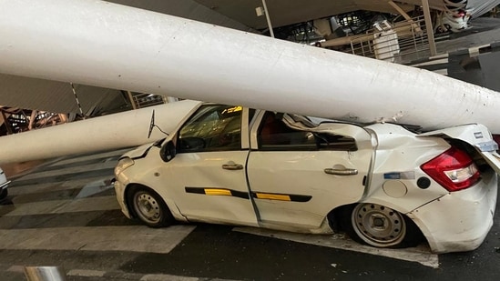 A portion of the roof at Delhi's IGI Airport Terminal 1 collapsed amid heavy rains. (HT)