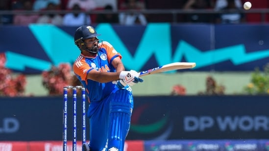 India's captain Rohit Sharma hits a four.(AFP)