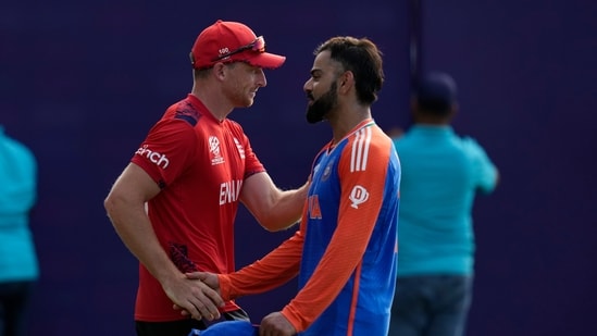 India's Virat Kohli, right, shake hands with England's captain Jos Buttler at the end of the ICC Men's T20 World Cup second semifinal(AP)