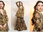 Aditi Rao Hydari is radiating Bibbojaan vibes in a stunning floral ethnic ensemble. The Heeramandi actress is a total stunner who can pull off any look to perfection. Known for her love of traditional wear, Aditi often dons mesmerizing anarkalis, sharara sets, and more. Her latest outfit, exuding sheer elegance, is no exception and is sure to inspire your ethnic wardrobe. Scroll down to take notes.(Instagram/@sanamratansi)