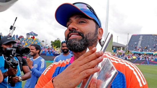 Rohit Sharma poses with the trophy.(Surjeet Yadav)