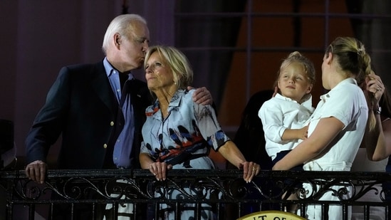 President Joe Biden kisses first lady Jill Biden during a fireworks show at a Fourth of July celebration at the White House in Washington, Tuesday, July 4, 2023. (AP Photo/Susan Walsh)(AP)