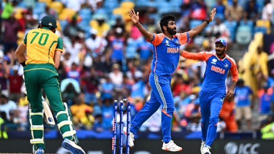 India's Jasprit Bumrah (C) celebrates after South Africa's Marco Jansen (L) is clean bowled during the ICC men's Twenty20 World Cup 2024 final cricket match between India and South Africa at Kensington Oval in Bridgetown(AFP)