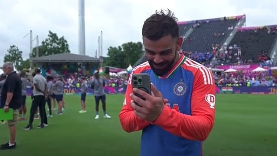 Virat Kohli during his video call with Anushka Sharma and kids after T20 World Cup win