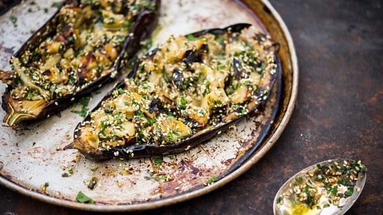 This image released by Milk Street shows a recipe for grilled eggplant with sesame and herbs. (AP)