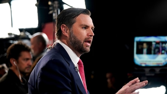 Senator JD Vance, a Republican from Ohio and Republican vice-presidential nominee, speaks with Sean Hannity, host of the Sean Hannity Show, not pictured, in the spin room following the first vice presidential debate at the CBS Broadcast Center in New York, US, on Tuesday, Oct. 1, 2024. (Bloomberg)