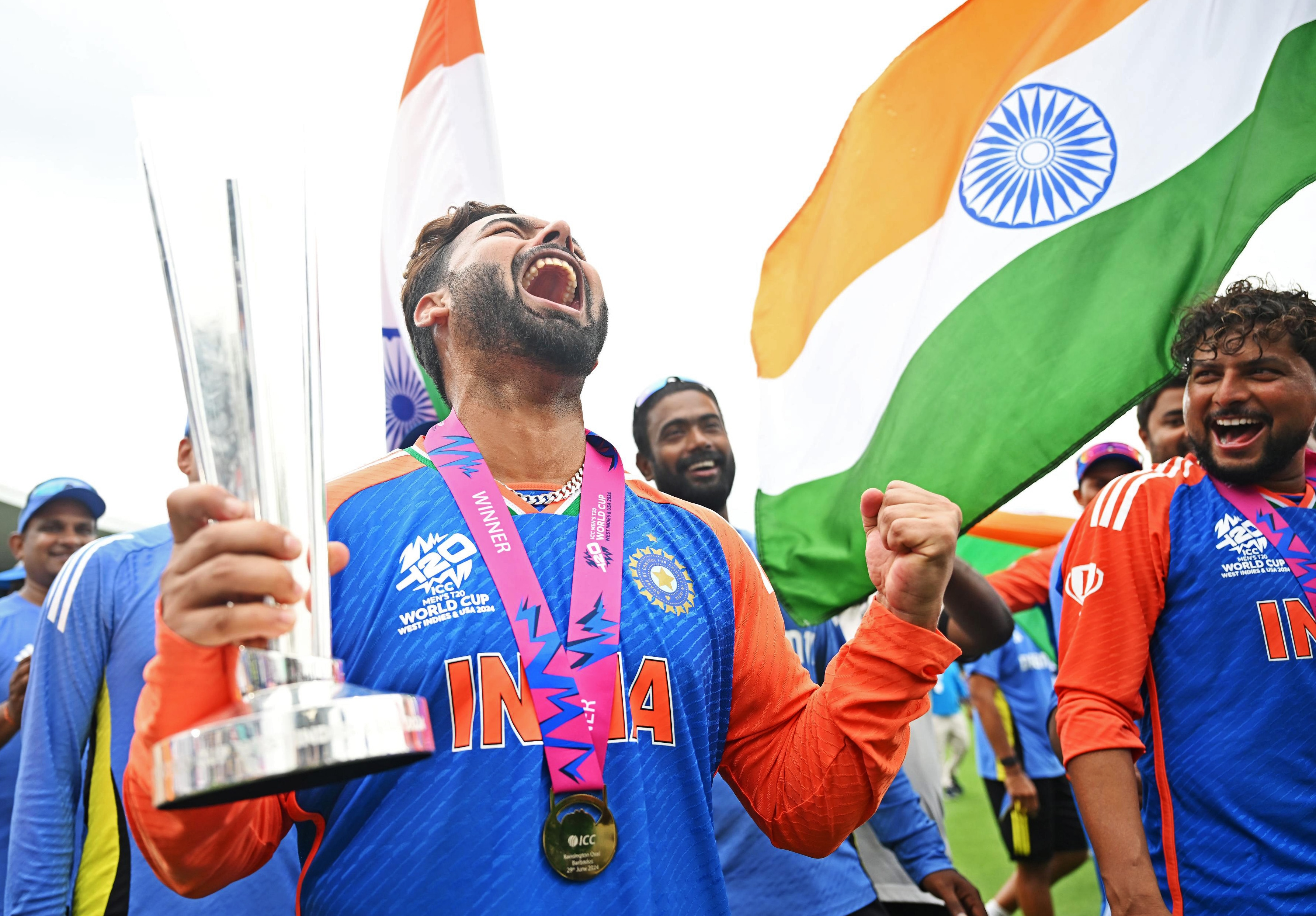 Barbados, Jun 30 (ANI): India's Rishabh Pant poses with the trophy after Team India wins the ICC Mens T20 World Cup 2024 final match against South Africa, at Kensington Oval in Barbados on Saturday. (ANI Photo) (ICC - X )