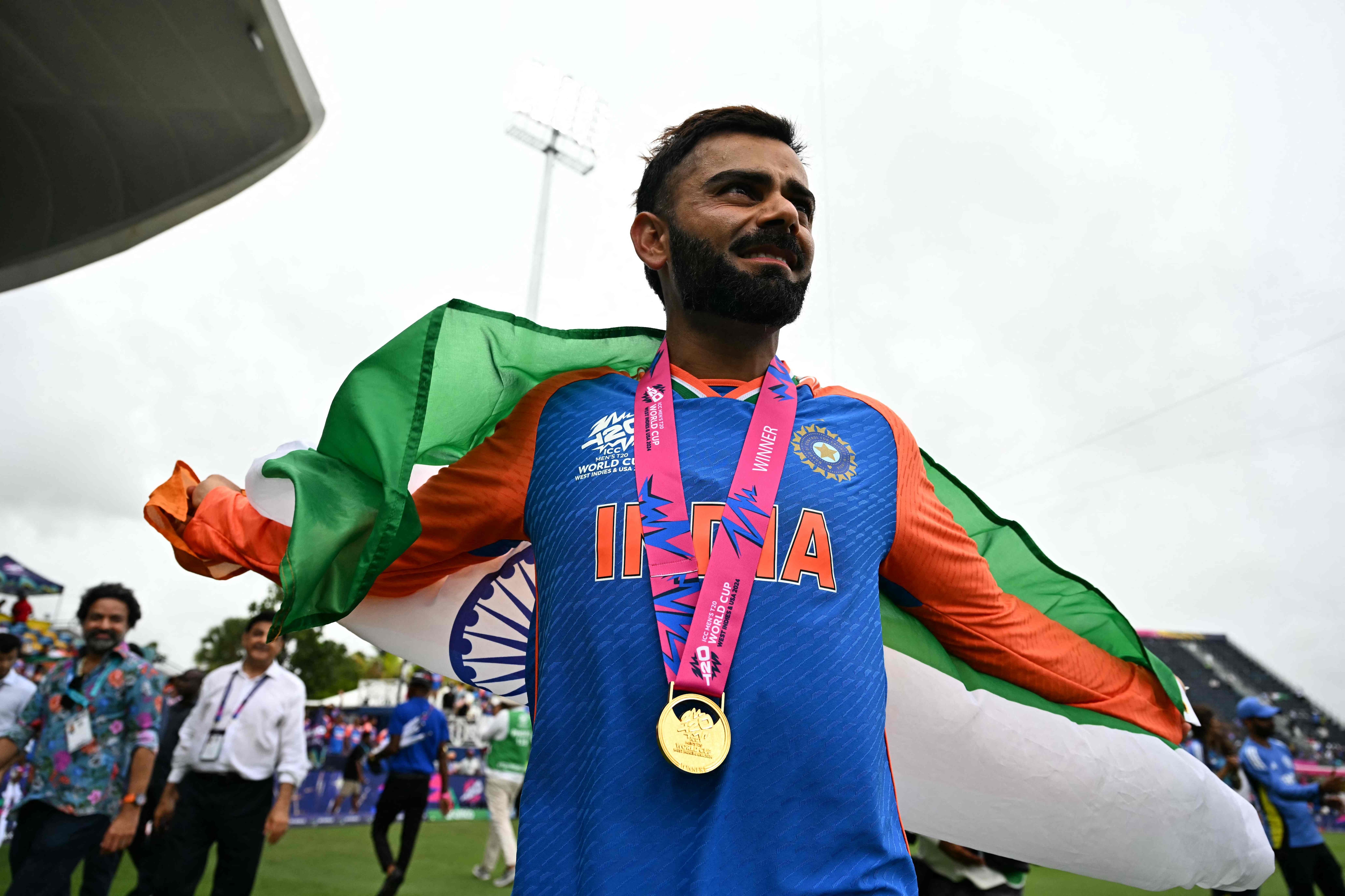 An emotional Virat Kohli celebrates India's long awaited triumph at the final of an ICC event. (AFP)