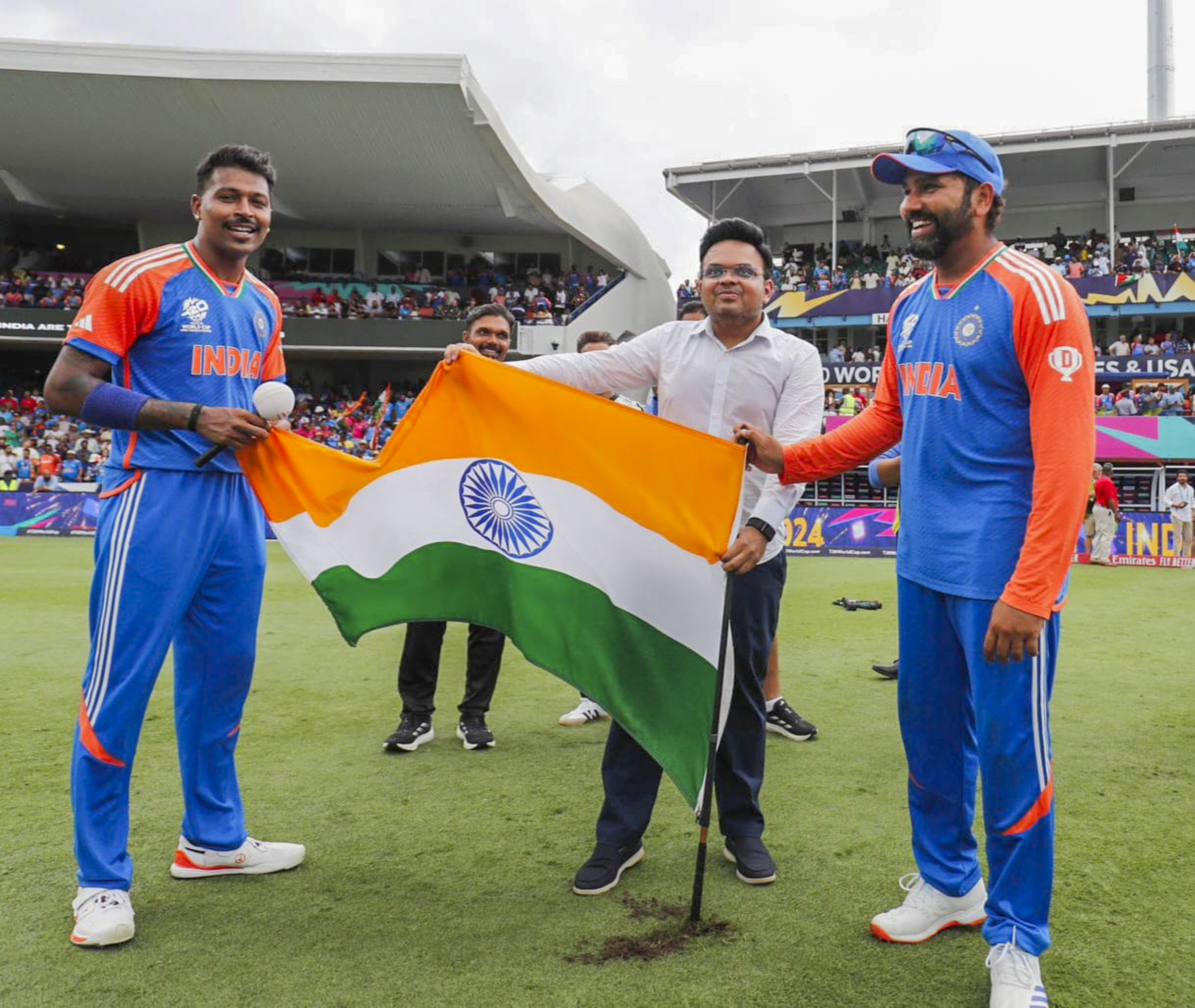 BCCI Secretary Jay Shah poses with Hardik Pandya and Rohit Sharma after the Indian captain planted the tricolour in Barbados. (PTI)